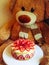 strawberry cake and teddy bear