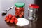 Strawberry cleared on a table with a hill of sugar