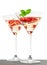 Strawberry cocktail with berries in martini glass