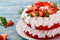 Strawberry and cream sponge cake. Homemade summer dessert on wooden table