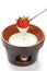 Strawberry dipped in white chocolate fondue