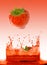 Strawberry falling in juice