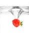 Strawberry falling into water