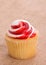 Strawberry flavored swirly top cupcake