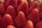 Strawberry fruit closeup background. Macro image