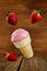 Strawberry ice cream with flying strawberries