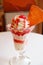 Strawberry Ice Cream Sundae Served on White Table