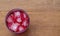 Strawberry juice on wooden table.