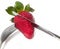 Strawberry with a knife and fork