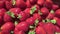 Strawberry in a metal container on a table