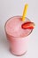 Strawberry milkshake with straw