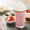 Strawberry milkshake with whipped cream