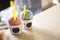 Strawberry And Mint Ice Creams In Cups On Counter