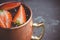 Strawberry moscow mule on thr rustic background