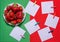 Strawberry paper for notes on red green background
