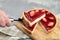 Strawberry pie with fresh berries. Cake shovel with piece of pie with fruit topping