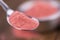 Strawberry powder on wooden background; selective focus