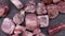 Strawberry quartz heap up jewel stones texture on black stone background. Moving right seamless loop backdrop