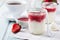 Strawberry rice pudding served in jar.Healthy breakfast.