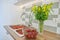 Strawberry season, washing berries in water in wash basin at home kitchen