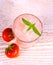 Strawberry slush in glass with fruits and mint, soft focus