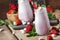 Strawberry smoothies and cocktails with fresh berry and green mint, decorated marshmallows, summer drink, wood old background,