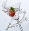 Strawberry Splashing Into Martini Glass