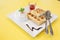 Strawberry Waffle whipped Cream on yellow desk