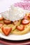 Strawberry waffles with whipped cream