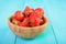 Strawberry Wood Bowl On Blue Background