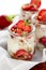 Strawberry yogurt dessert with nuts and muesli, perfect as a healthy breakfast