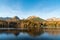 Strbske pleso lake with peaks on the background anc oolourful forest in autumn Vysoke Tatry mountains in Slovakia