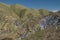 Streaked green and rainbow mountains in Maragua Crater. Bolivia