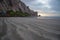 Streaky sand patterns at sunset at Morro Rock on the central coast of California at Morro Bay California USA