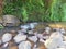 A stream and an array of rocks in a beautiful garden