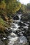 Stream cascading over rocky stream bed, Cumbria UK