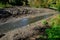 stream cleaning. to clean the pond from alluvium of mud