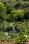 stream on the edge of a hill