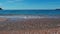 Stream flowing into the sea on beach