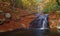 Stream and landscape of Santa Fe valley in Montseny Natural Park in autumn. Chestnut, beech and oak forest, Barcelona, Spain