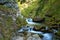 A stream of mountain water with several smaller or larger waterfalls is a characteristic of tourism in the Prosiek-Kvacany valley