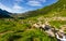 Stream among the rocks in grassy valley