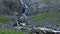 A stream with a waterfall in the mountains of the polar Urals. Russia