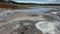 Streams from hot springs flow in the caldera of the extinct volcano Uzon.