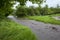 Streams of water flow after a heavy rainfall.