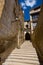 Street with arch and stairs in Calaceite. Teruel