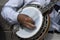 Street artist playing banjo musician detail of hands