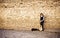 Street artist standing with her guitar