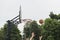 Street basketball game. Basketball shield, Basket and ball on background of sky, street in summer. Hands of Basketball