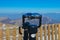 Street binoculars with mountains view